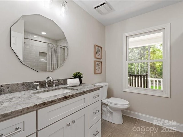 300 Hugh Crocker Rd, Matthews, NC 28104 - bathroom featuring baseboards, vanity, toilet, and curtained shower