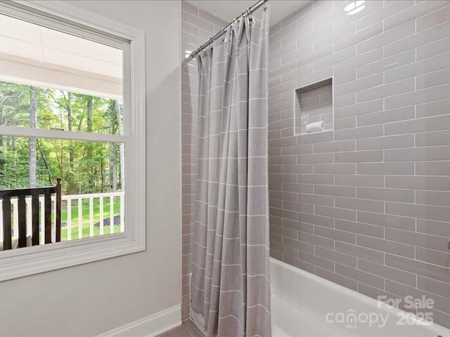 300 Hugh Crocker Rd, Matthews, NC 28104 - full bath with shower / bathtub combination with curtain, plenty of natural light, and baseboards