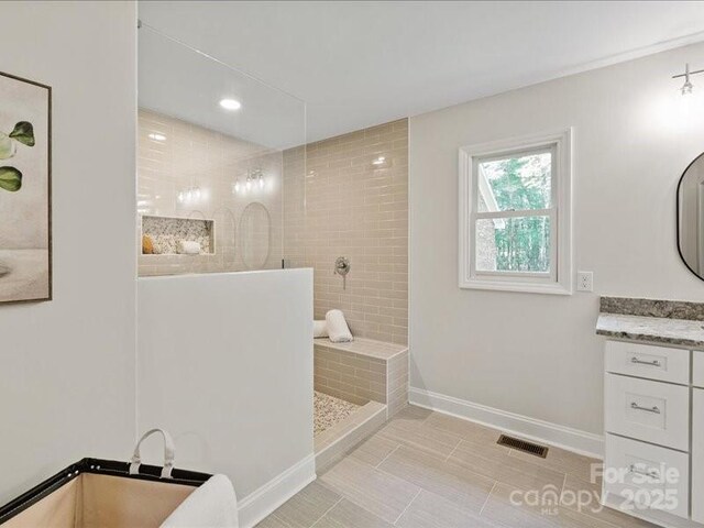 300 Hugh Crocker Rd, Matthews, NC 28104 - bathroom featuring baseboards, a walk in shower, vanity, tile patterned flooring, and recessed lighting