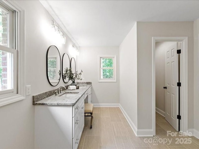 300 Hugh Crocker Rd, Matthews, NC 28104 - bathroom featuring baseboards and vanity