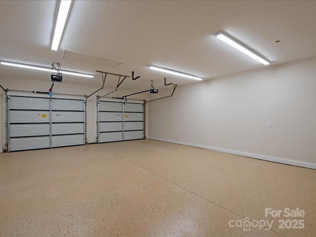 300 Hugh Crocker Rd, Matthews, NC 28104 - garage featuring a garage door opener and baseboards