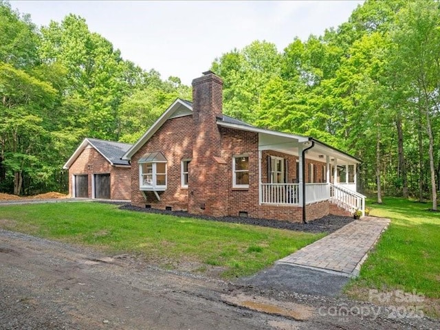 300 Hugh Crocker Rd, Matthews, NC 28104 - view of front of property featuring a porch, brick siding, a front yard, a chimney, and crawl space