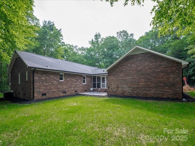 300 Hugh Crocker Rd, Matthews, NC 28104 - back of house featuring crawl space, brick siding, a patio, and a lawn
