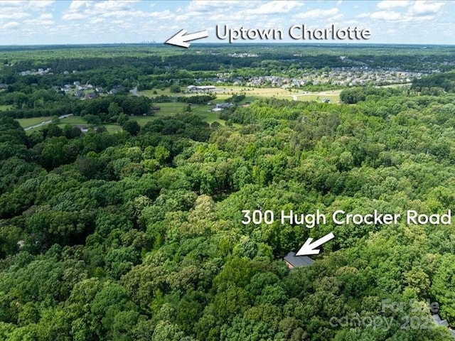 300 Hugh Crocker Rd, Matthews, NC 28104 - aerial overview of property's location with a heavily wooded area