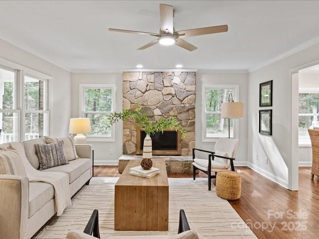 300 Hugh Crocker Rd, Matthews, NC 28104 - living area with plenty of natural light, baseboards, crown molding, and light wood-style flooring