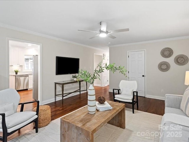 300 Hugh Crocker Rd, Matthews, NC 28104 - living area featuring ceiling fan, ornamental molding, wood finished floors, and baseboards