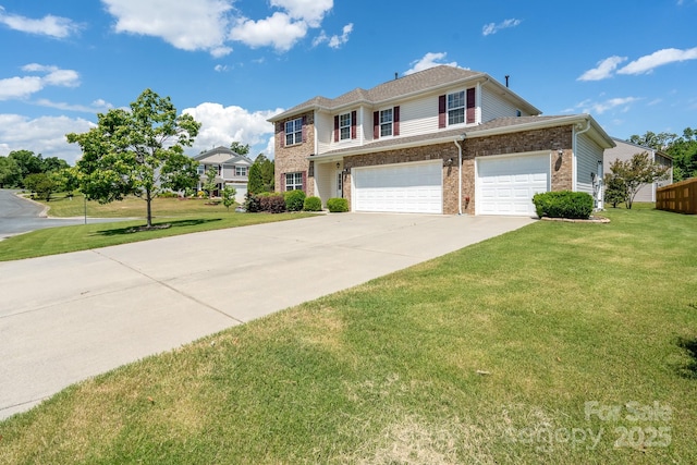 4321 Tucker Chase Dr, Midland, NC 28107 - traditional-style house with concrete driveway, a garage, brick siding, and a front lawn