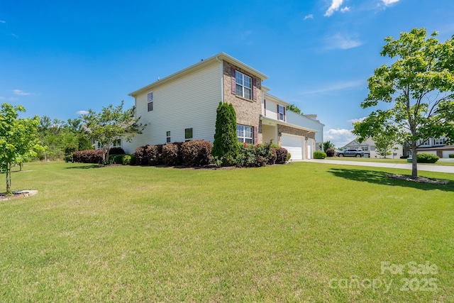 4321 Tucker Chase Dr, Midland, NC 28107 - view of side of property with a yard, concrete driveway, a garage, and brick siding