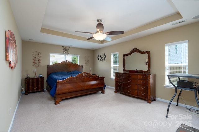 4321 Tucker Chase Dr, Midland, NC 28107 - bedroom featuring a raised ceiling, carpet, baseboards, and visible vents