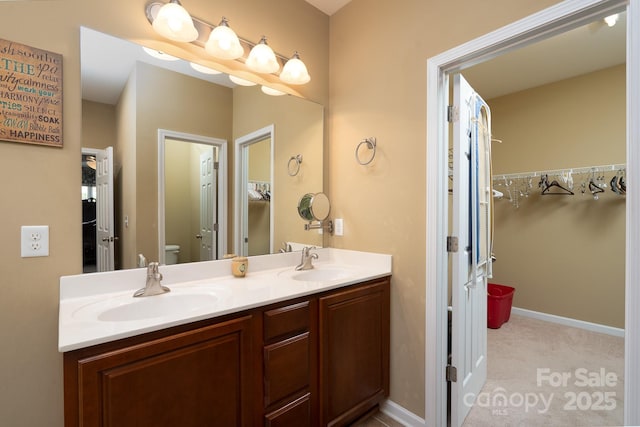 4321 Tucker Chase Dr, Midland, NC 28107 - full bathroom featuring double vanity, toilet, and a sink