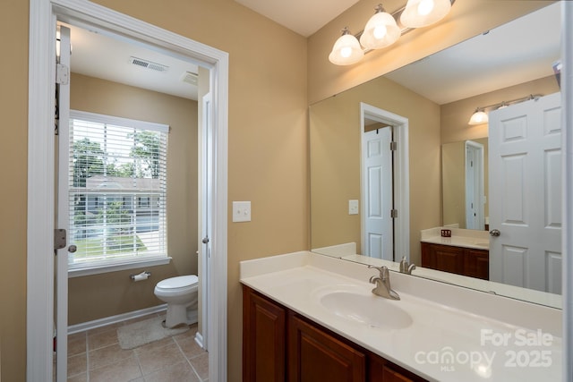 4321 Tucker Chase Dr, Midland, NC 28107 - bathroom featuring tile patterned floors, toilet, visible vents, and vanity