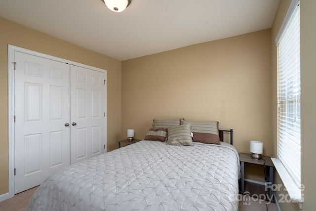 4321 Tucker Chase Dr, Midland, NC 28107 - bedroom with carpet flooring, a closet, and baseboards