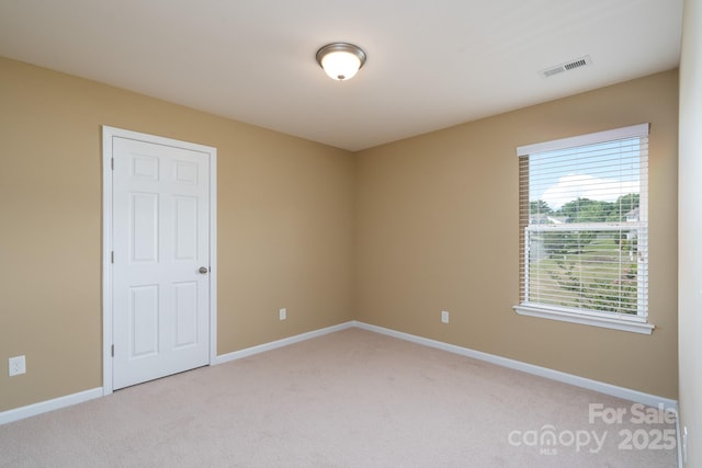 4321 Tucker Chase Dr, Midland, NC 28107 - spare room with visible vents, baseboards, and light carpet
