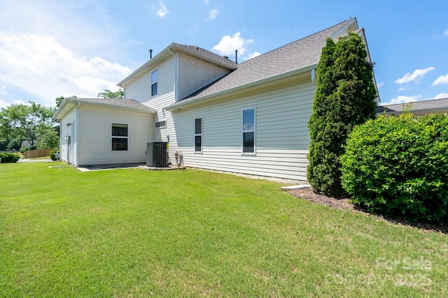 4321 Tucker Chase Dr, Midland, NC 28107 - rear view of property featuring central AC and a yard