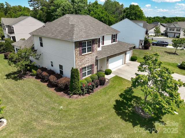 4321 Tucker Chase Dr, Midland, NC 28107 - view of front of house with roof with shingles, concrete driveway, a front lawn, and a residential view