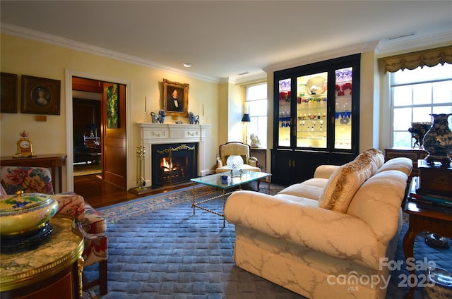 185 Macon Ave Unit 10B, Asheville, NC 28804 - living room featuring a lit fireplace, ornamental molding, visible vents, and dark wood finished floors