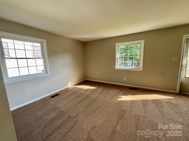 2020 Longleaf Dr, Charlotte, NC 28210 - carpeted empty room featuring baseboards