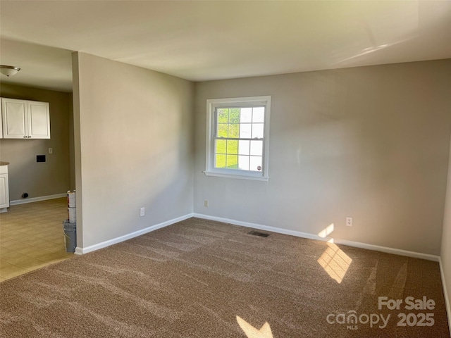 2020 Longleaf Dr, Charlotte, NC 28210 - carpeted spare room featuring baseboards