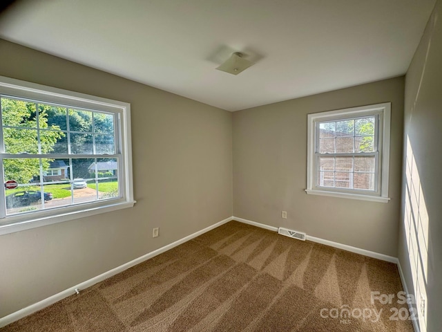 2020 Longleaf Dr, Charlotte, NC 28210 - carpeted spare room featuring baseboards
