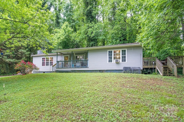 857 Hills Rd, Belmont, NC 28012 - rear view of property featuring a lawn and a wooden deck