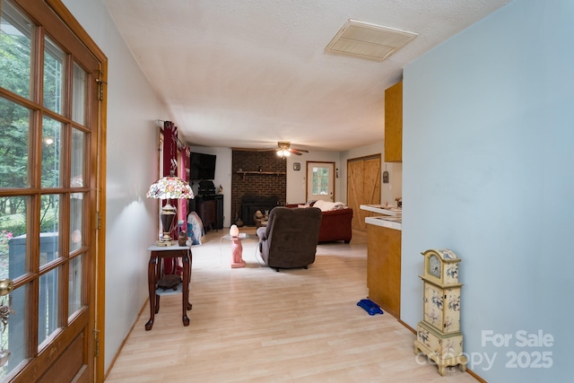 857 Hills Rd, Belmont, NC 28012 - hallway with baseboards, visible vents, and light wood finished floors