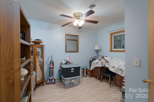 857 Hills Rd, Belmont, NC 28012 - home office featuring a textured ceiling, ceiling fan, and light wood finished floors
