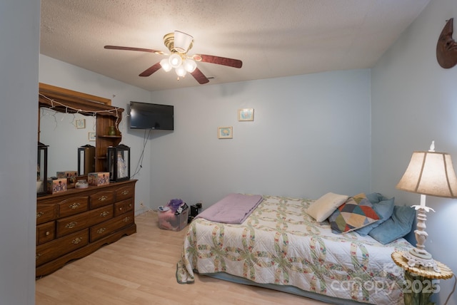 857 Hills Rd, Belmont, NC 28012 - bedroom with a ceiling fan and wood finished floors