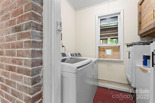 851 Gist Rd, Rock Hill, SC 29732 - washroom with washer and dryer, cabinet space, and ornamental molding