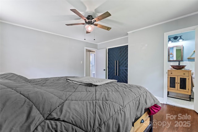 851 Gist Rd, Rock Hill, SC 29732 - bedroom featuring wood finished floors, crown molding, a ceiling fan, ensuite bathroom, and baseboards