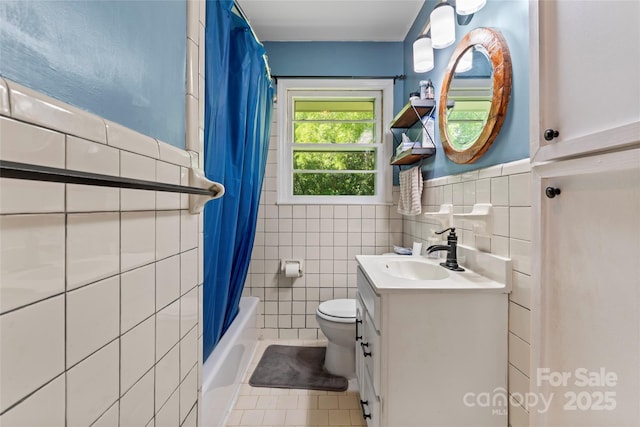 851 Gist Rd, Rock Hill, SC 29732 - full bath with tile walls, toilet, tile patterned floors, vanity, and shower / bath combo