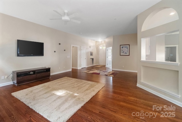 12013 Regent Ridge Ln, Charlotte, NC 28278 - unfurnished living room with a ceiling fan, wood finished floors, and baseboards
