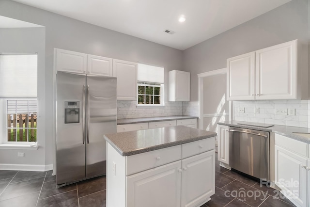 12013 Regent Ridge Ln, Charlotte, NC 28278 - kitchen featuring appliances with stainless steel finishes, white cabinets, and recessed lighting