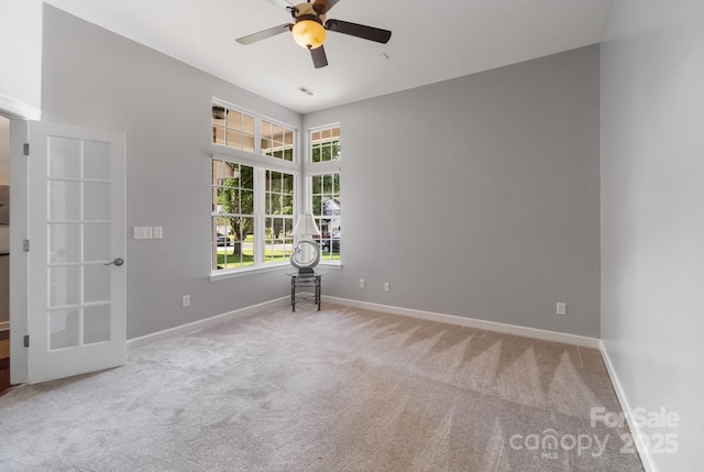12013 Regent Ridge Ln, Charlotte, NC 28278 - empty room with carpet flooring, a ceiling fan, and baseboards