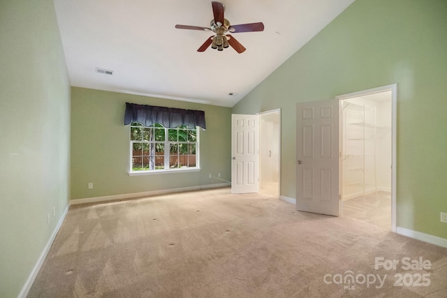 12013 Regent Ridge Ln, Charlotte, NC 28278 - unfurnished bedroom featuring carpet floors, high vaulted ceiling, baseboards, and ceiling fan