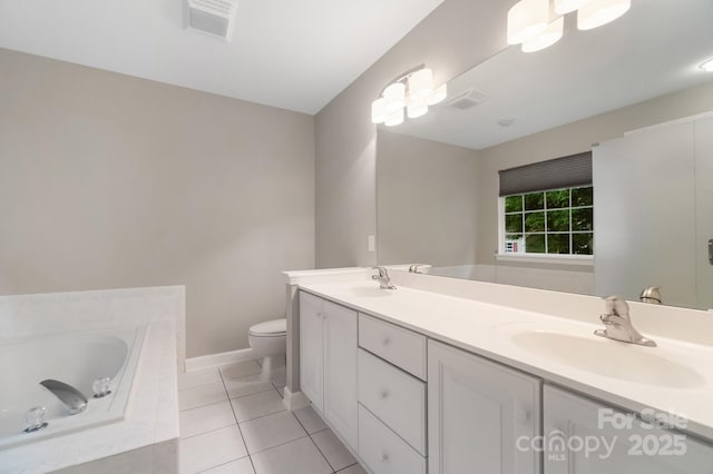 12013 Regent Ridge Ln, Charlotte, NC 28278 - bathroom featuring tile patterned flooring, double vanity, a bath, baseboards, and toilet