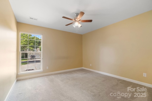 12013 Regent Ridge Ln, Charlotte, NC 28278 - carpeted spare room with ceiling fan and baseboards