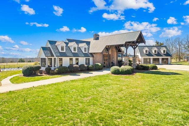 12613B Oak Grove Rd, Stanfield, NC 28163 - new england style home featuring concrete driveway, a front lawn, metal roof, a standing seam roof, and a chimney