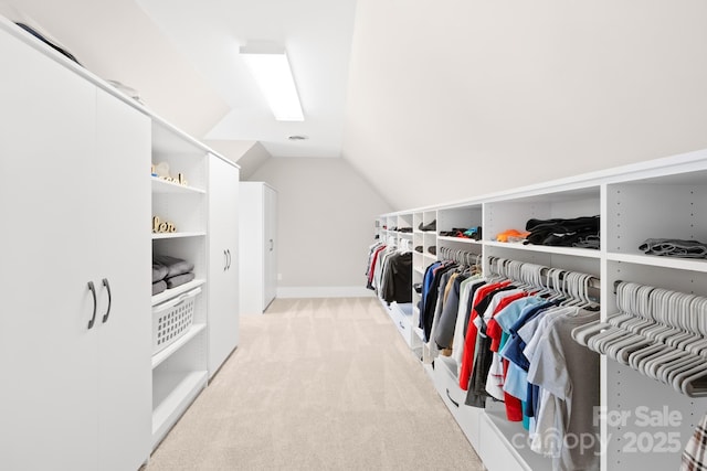 12613B Oak Grove Rd, Stanfield, NC 28163 - walk in closet featuring light carpet and lofted ceiling