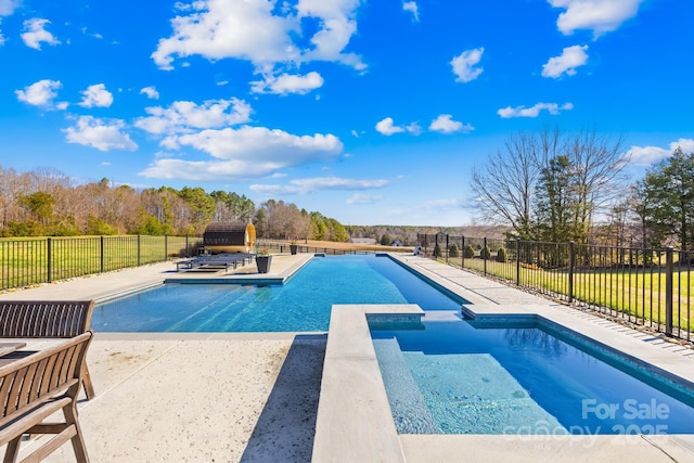 12613B Oak Grove Rd, Stanfield, NC 28163 - view of swimming pool featuring a patio area, fence, and a pool with connected hot tub
