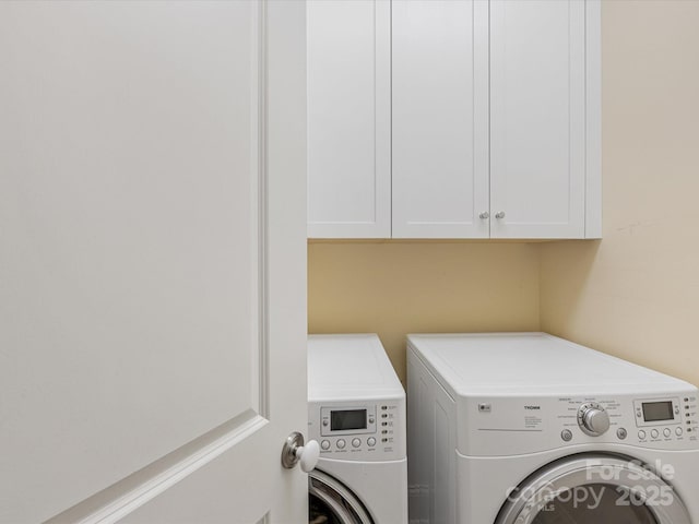 3825 Mountain Cove Dr, Charlotte, NC 28216 - laundry area with independent washer and dryer and cabinet space