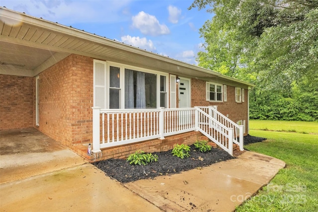 133 Jo Monni Loop, Statesville, NC 28625 - property entrance with brick siding and a lawn