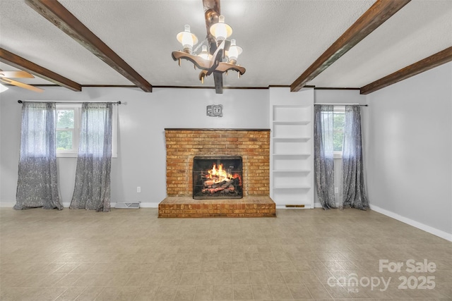 133 Jo Monni Loop, Statesville, NC 28625 - unfurnished living room with beamed ceiling, a fireplace, a chandelier, baseboards, and a textured ceiling