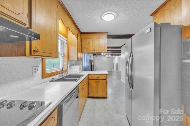133 Jo Monni Loop, Statesville, NC 28625 - kitchen with stainless steel appliances, a sink, a peninsula, light floors, and under cabinet range hood