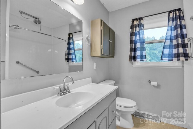 133 Jo Monni Loop, Statesville, NC 28625 - full bath with toilet, vanity, healthy amount of natural light, and baseboards