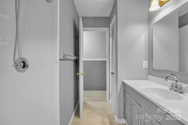133 Jo Monni Loop, Statesville, NC 28625 - full bathroom with vanity, tile patterned floors, and baseboards