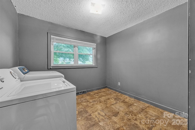 133 Jo Monni Loop, Statesville, NC 28625 - washroom with washing machine and dryer and a textured ceiling