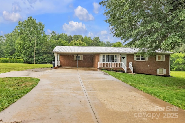133 Jo Monni Loop, Statesville, NC 28625 - ranch-style house featuring brick siding, driveway, a front yard, a porch, and an attached carport