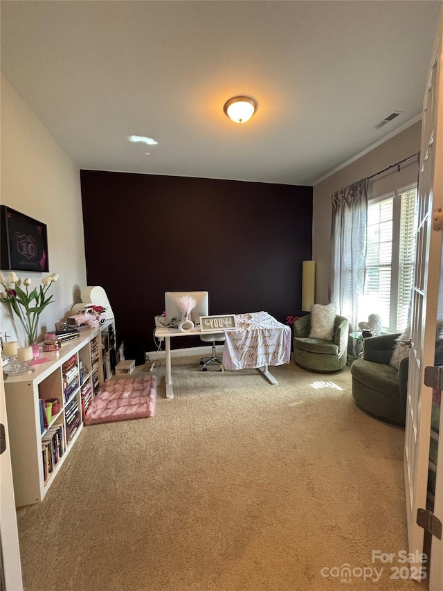 bedroom featuring visible vents and carpet