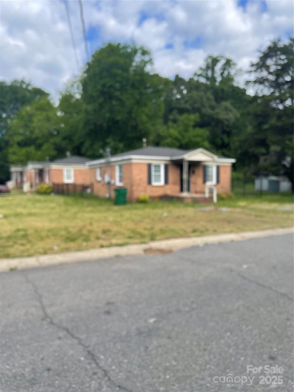 1902 Catherine Simmons Ave Unit 30, Charlotte, NC 28216 - single story home featuring a chimney and a front yard