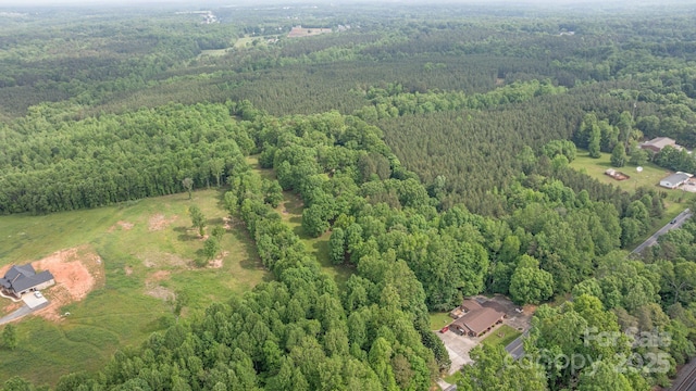 drone / aerial view with a forest view